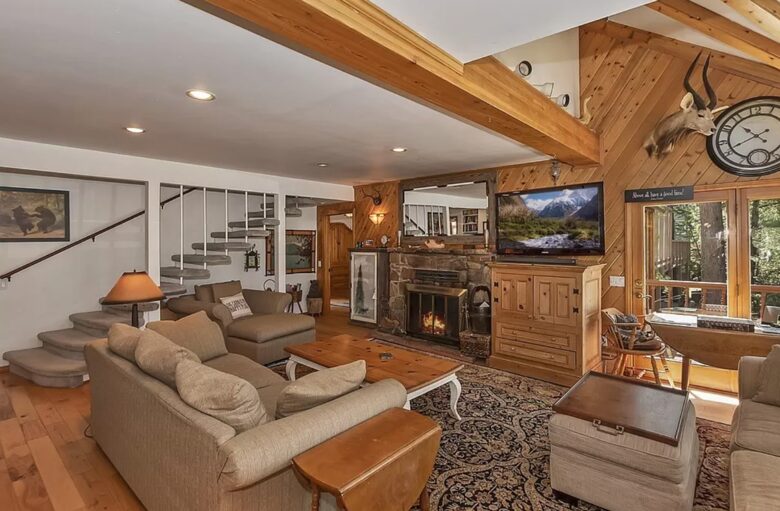 Open living room with fireplace and views