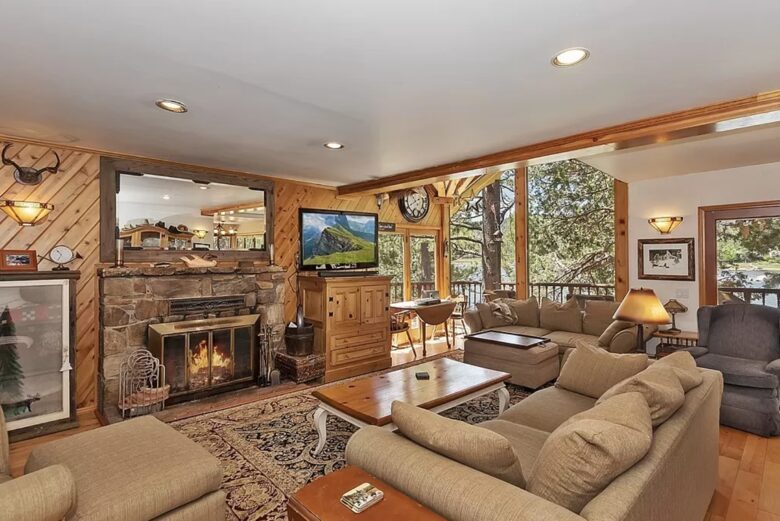 Open living room with fireplace and views