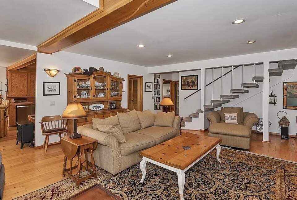 Open living room with fireplace and views