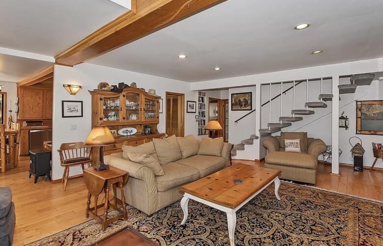 Open living room with fireplace and views