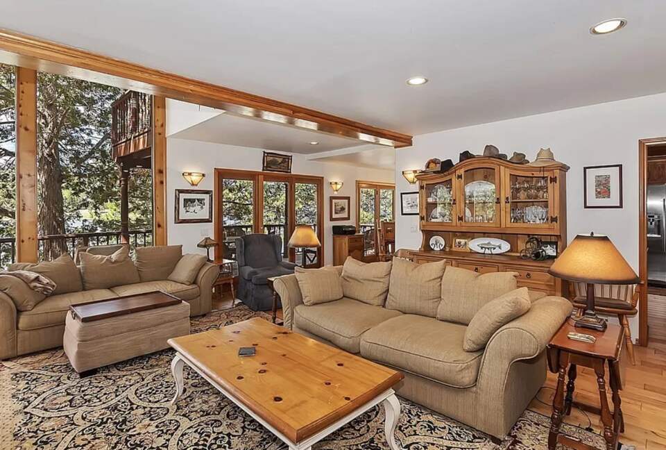 Open living room with fireplace and views