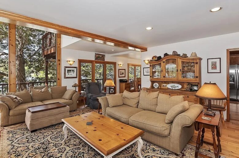 Open living room with fireplace and views