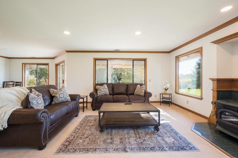 Home Exchange in San Miguel, CA living room with lush leather couches
