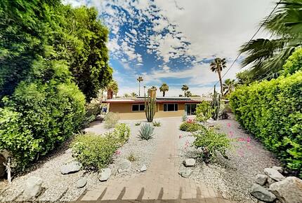 Home Exchange in Palm Springs, CA desert yard with blue skies