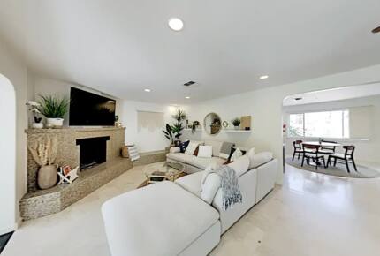 Home Exchange in Palm Springs, CA cornered fireplace and clean lines