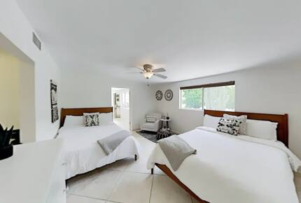 Home Exchange in Palm Springs, CA guest bedroom with two queen beds