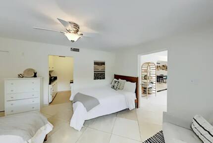 Home Exchange in Palm Springs, CA spacious bedroom with two queens