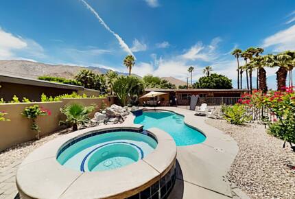 Home Exchange in Palm Springs, CA resort style pool with hot tub