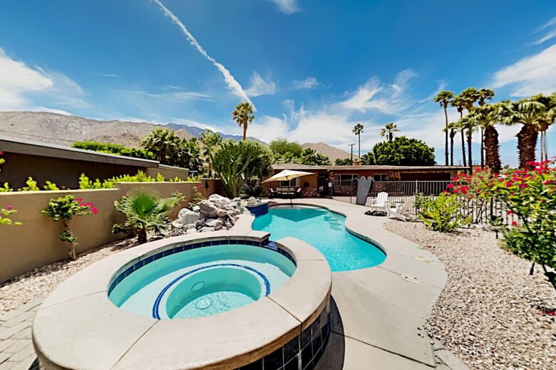 Home Exchange in Palm Springs, CA resort style pool with hot tub