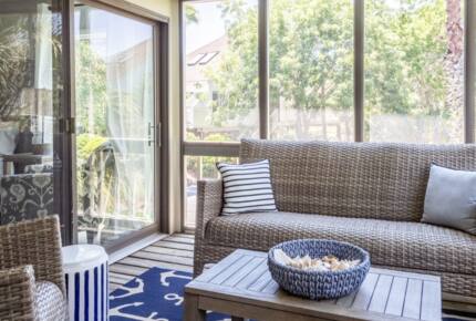 Sun room with views of golf course