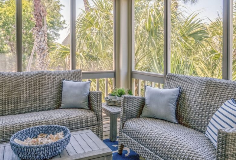Sun room with views of golf course