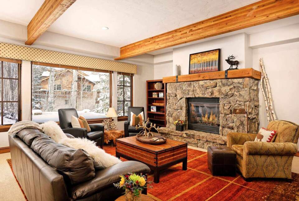 Downstairs media room with fireplace