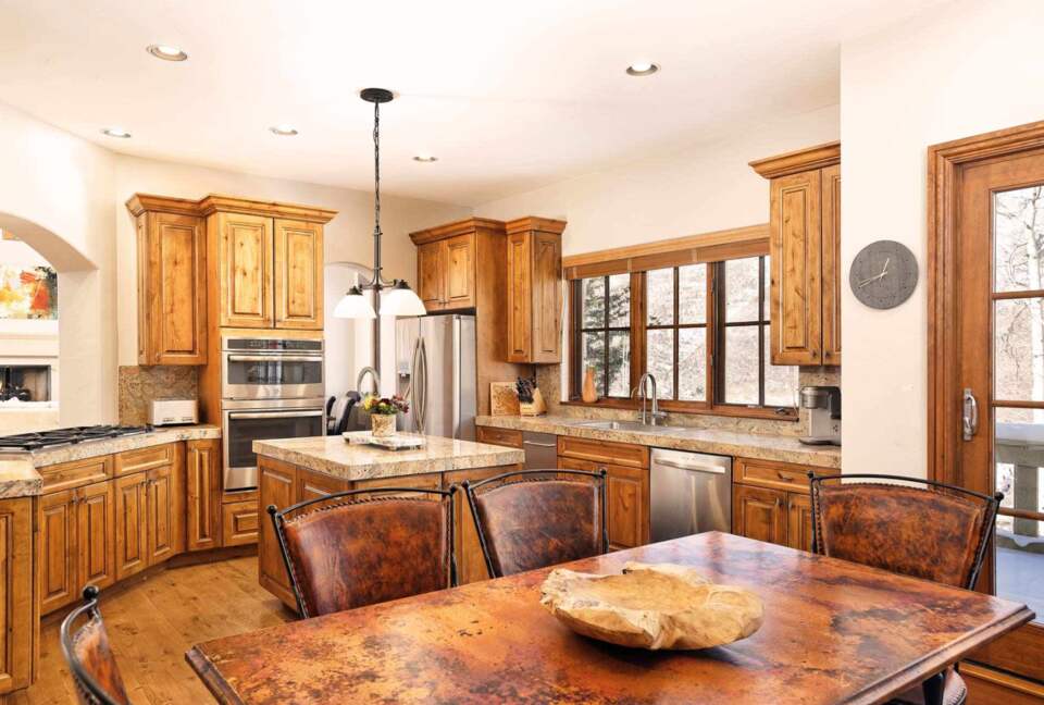 Gourmet kitchen with breakfast table