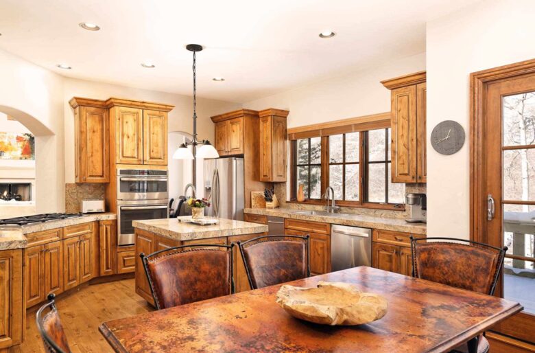 Gourmet kitchen with breakfast table