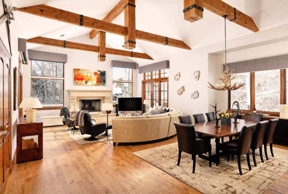 Open floor plan with exposed beams