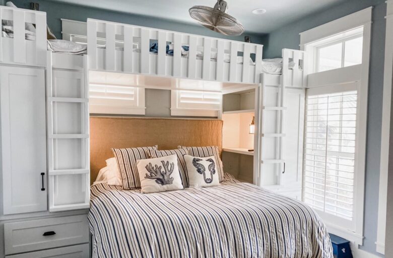 Guest room with king bed under bunk