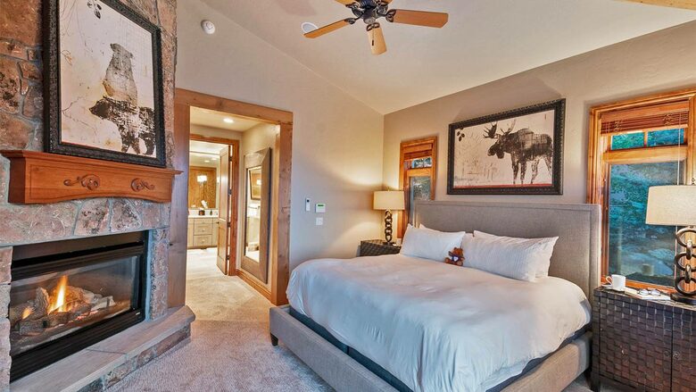 Home Exchange in Steamboat Springs, CO master bedroom #1 w fireplace
