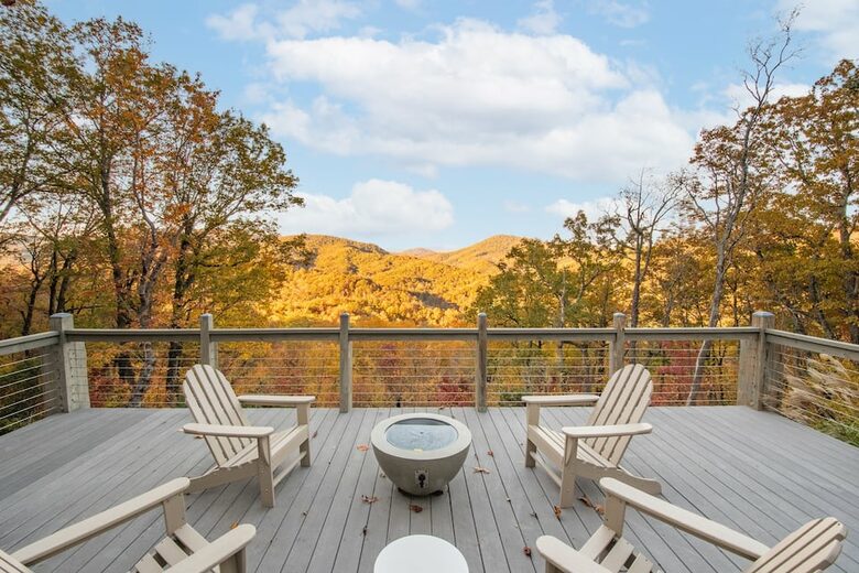 Home exchange in Fairview NC, deck with fire pit overlooking foliage