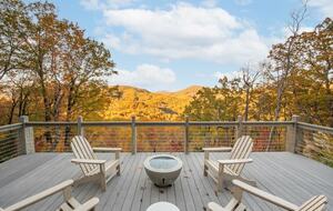 Home exchange in Fairview NC, deck with fire pit overlooking foliage