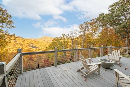 Home exchange in Fairview NC, deck with Adirondack chairs and fire pit