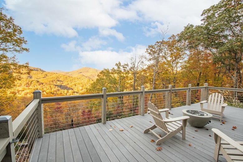 Home exchange in Fairview NC, deck with Adirondack chairs and fire pit
