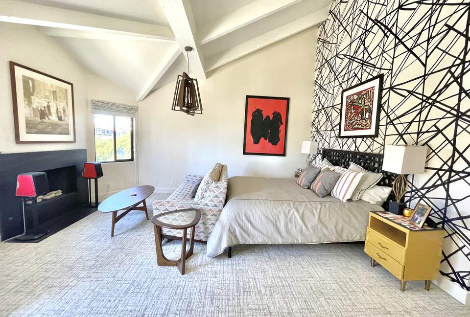 Home Exchange in Oxnard, CA spacious master bedroom with fireplace