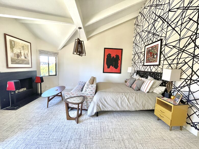 Home Exchange in Oxnard, CA spacious master bedroom with fireplace