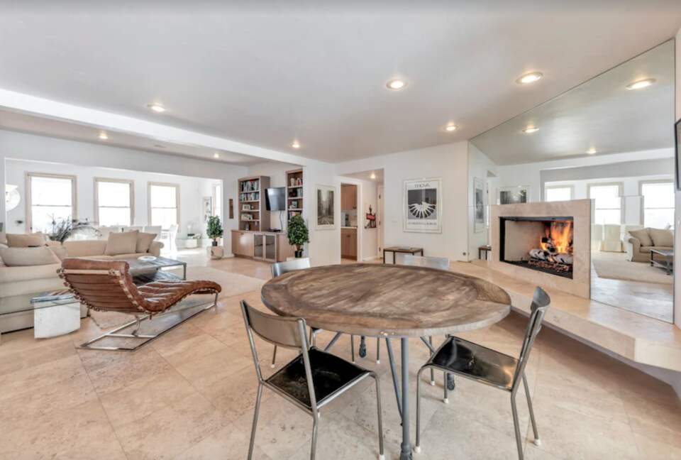 Open living with fireplace