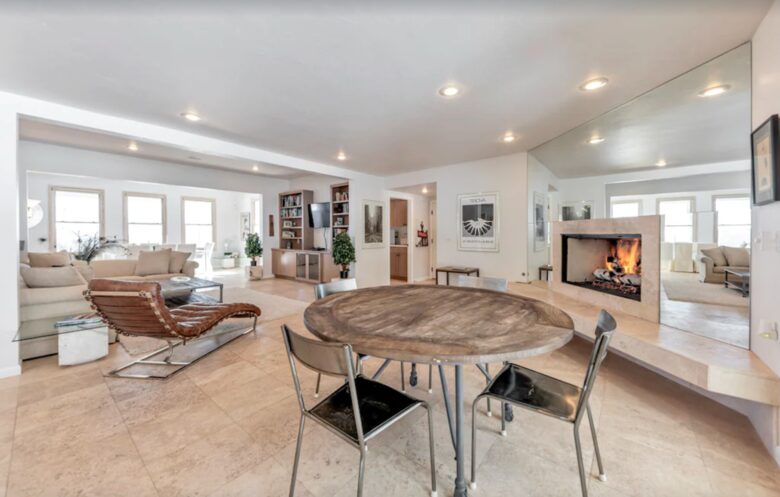 Open living with fireplace