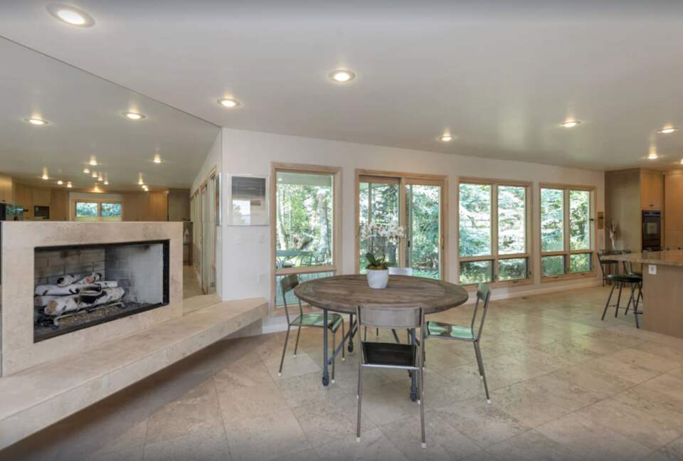 Open living with fireplace