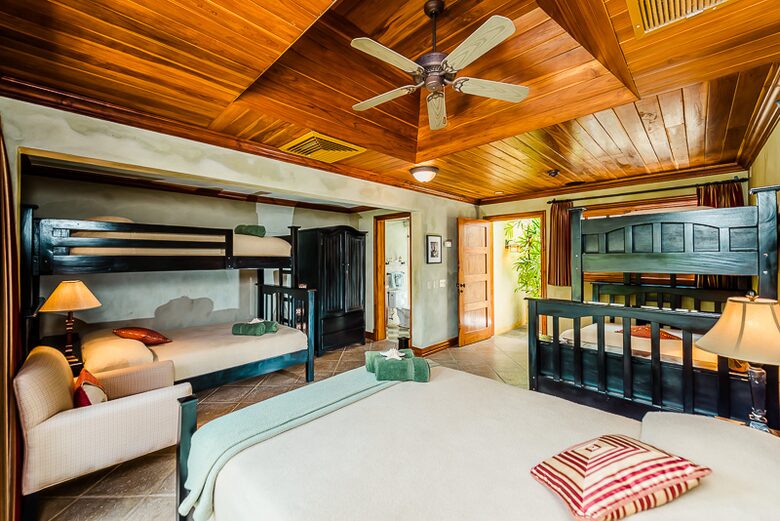 Home Exchange in Playa Langosta, Costa Rica bunk room with five beds