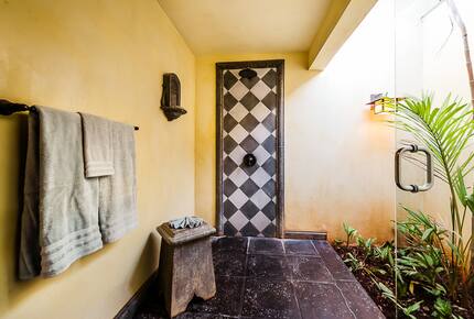 Home Exchange in Playa Langosta, Costa Rica master outdoor bathroom