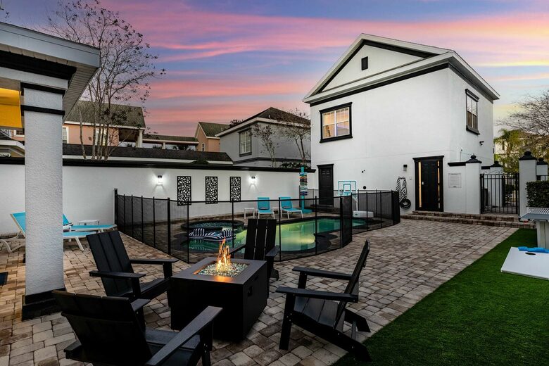 Home Exchange in Reunion, FL, fire pit and pool safety with guest view