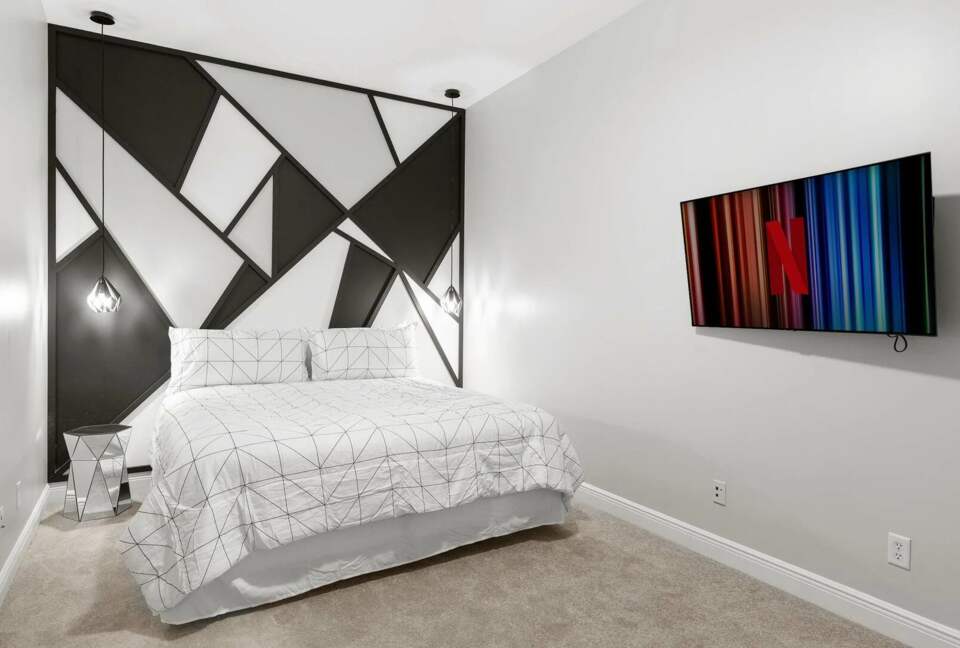 Home Exchange in Reunion, FL, guest house bedroom with television