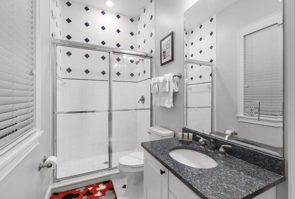 Home Exchange in Reunion, FL, guest house bathroom with walk in shower