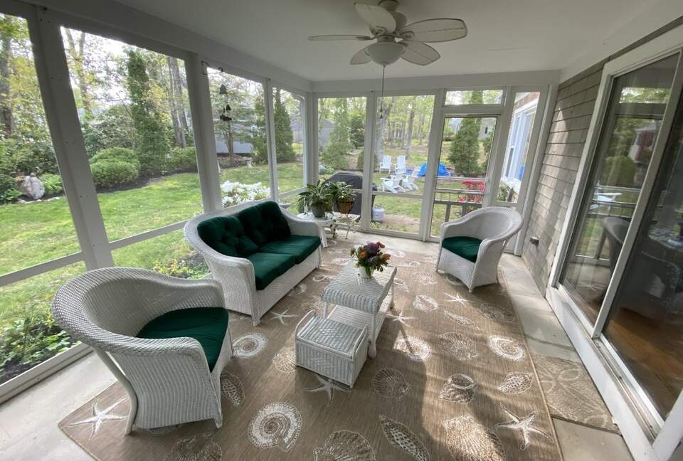 Home Exchange in North Falmouth, MA, sunroom with a fan