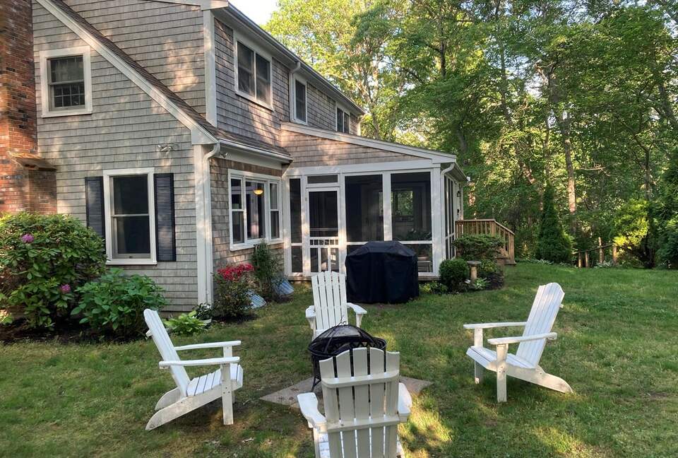 Home Exchange in North Falmouth, MA, fire pit with lovely yard