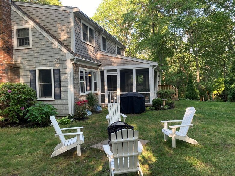 Home Exchange in North Falmouth, MA, fire pit with lovely yard
