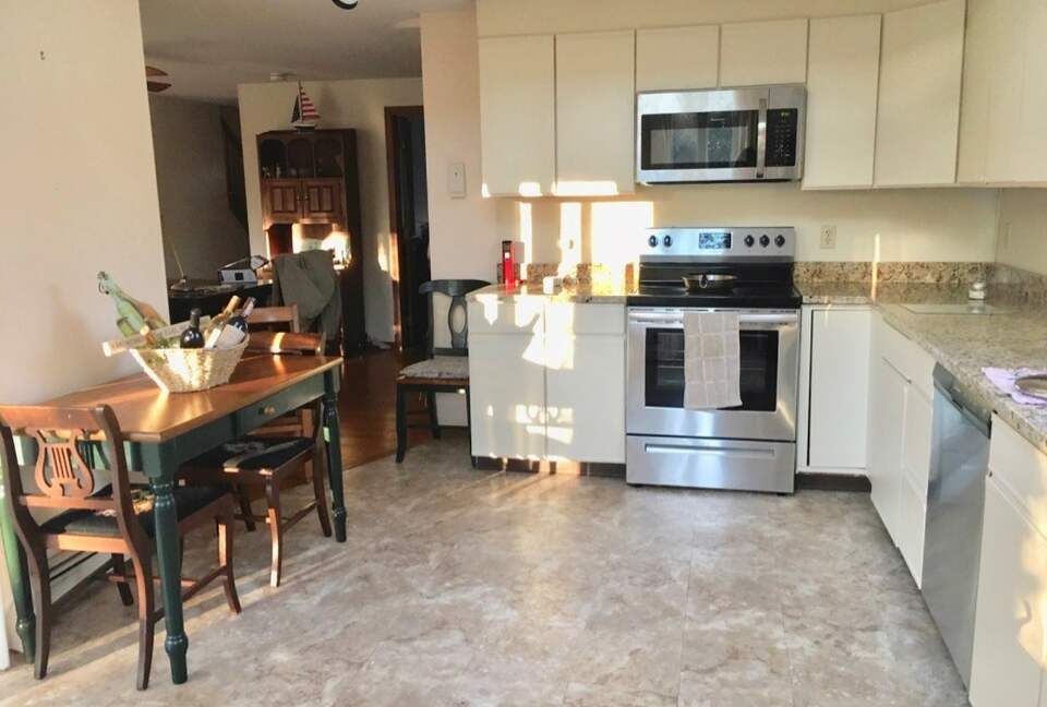Home Exchange in North Falmouth, MA, updated kitchen with dining table