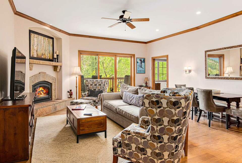 Home Exchange in Beaver Creek, CO, living room with a cozy fireplace