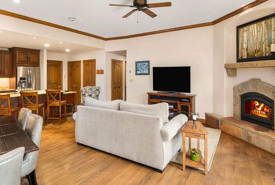 Home Exchange in Beaver Creek, CO, living room with a cozy fireplace