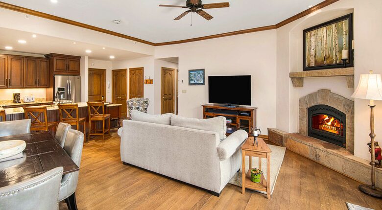 Home Exchange in Beaver Creek, CO, living room with a cozy fireplace