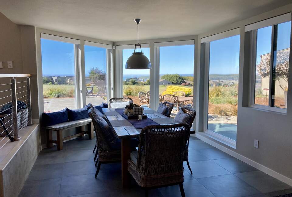 Dining room comfortably seats 6 or up to 10 with benches.