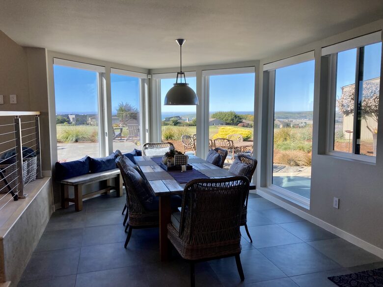 Dining room comfortably seats 6 or up to 10 with benches.