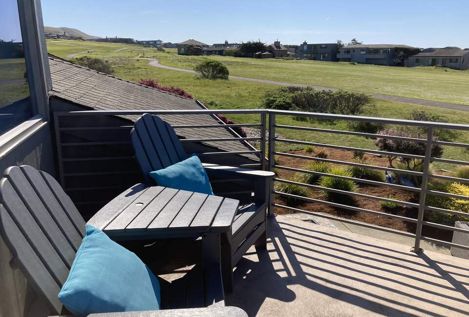 Seating for 2 on primary bedroom balcony.