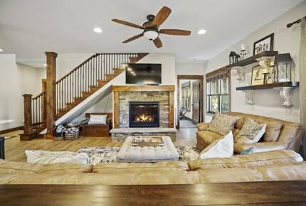 Home Exchange in McCall, ID family room with stone fireplace