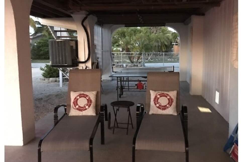 Home Exchange in Marathon, FL patio lounge chairs