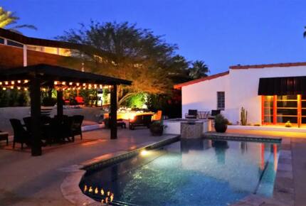 Home Exchange in Palm Springs, CA night time pool view