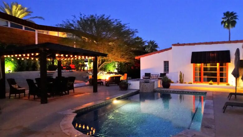 Home Exchange in Palm Springs, CA night time pool view