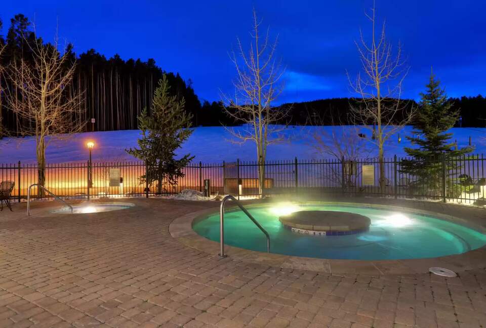 Hot tubs adjacent to fitness center and sauna